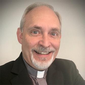 Assistant Development Director Fr. Christopher Rowe